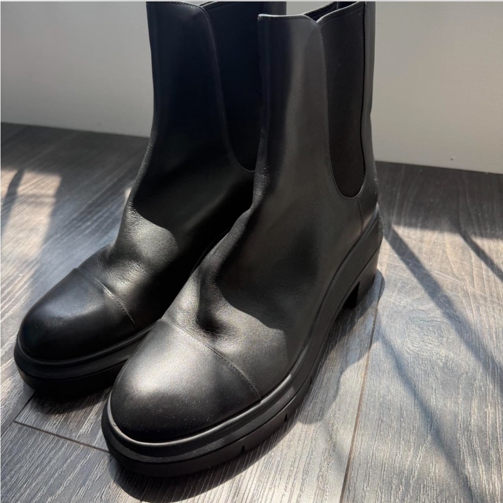 UNWORN Stuart Weitzman women’s black combat boots